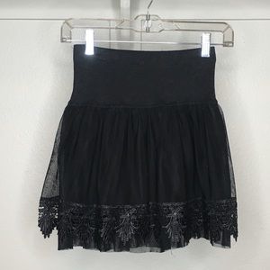 Cute sheer lace skirt with cutout